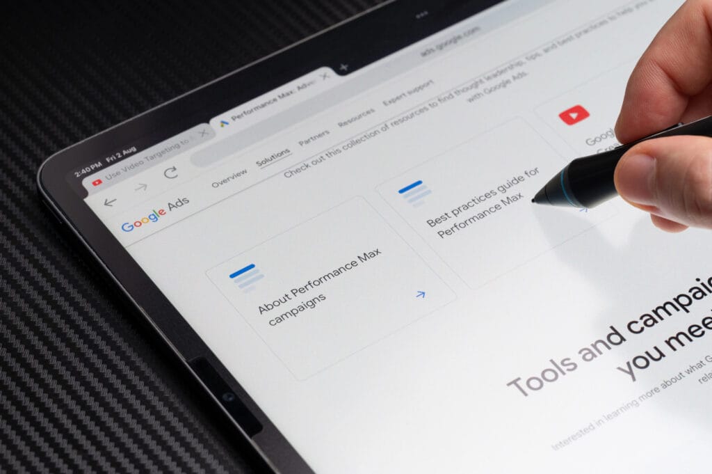 Home 12 A Close Up Of A Tablet Of Google Ads